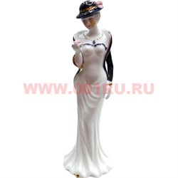 Девушка с цветком в шляпке из фарфора (20 см высота) - фото 92349