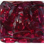 Кабошоны 15x30 овальные граненые из красного стекла