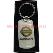 Брелок марки машин из камня Nissan
